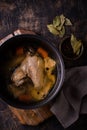 Chicken broth soup or bouillon in pan Royalty Free Stock Photo