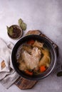 Chicken broth soup or bouillon in pan Royalty Free Stock Photo