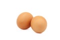 Two chicken brown eggs on a white background Royalty Free Stock Photo