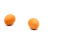 Two chicken brown eggs on a white background Royalty Free Stock Photo