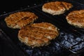 Chicken burger composition on a bbq grill