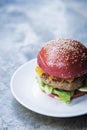 Chicken burger with gherkins beetroot bread bun