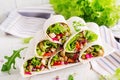 Chicken burrito. Healthy lunch. Mexican street food fajita tortilla wraps Royalty Free Stock Photo