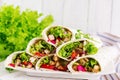 Chicken burrito. Healthy lunch. Mexican street food fajita tortilla wraps Royalty Free Stock Photo