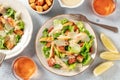 Chicken Caesar salad, overhead flat lay shot with wine Royalty Free Stock Photo