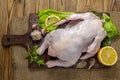 Chicken carcass on a cutting Board  on a wooden table Royalty Free Stock Photo
