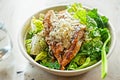 Chicken Ceasar salad. Cos lettuce leaves, grilled chicken breast sliced, parmesan cheese. Restaurant table Royalty Free Stock Photo