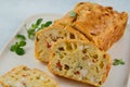 Chicken, cheese and pepper muffin on light grey background. Savory muffin. Healthy lunch or snack.