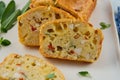 Chicken, cheese and pepper muffin on light grey background. Savory muffin. Healthy lunch or snack.