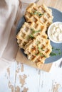 Chicken and cheese waffles with sour cream sauce