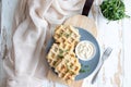 Chicken and cheese waffles with sour cream sauce