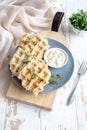 Chicken and cheese waffles with sour cream sauce Royalty Free Stock Photo