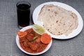 Tamilnadu cuisine chicken chettinadu, butter naan Royalty Free Stock Photo