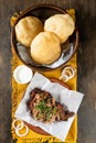 Chicken Chop or chap with dal puri, raita and onion isolated on table top view of indian, bangladeshi and pakistani food