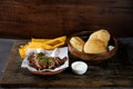 Chicken Chop or chap with dal puri, raita and onion isolated on table top view of indian, bangladeshi and pakistani food