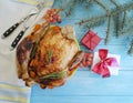 Chicken christmas tree dinner branch on a wooden background