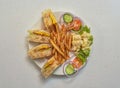 chicken club sandwich with fries, russain salad served in a dish isolated on grey background top view of indian, pakistani food Royalty Free Stock Photo