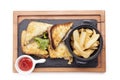 Chicken club sandwich on a wooden cutting board isolated on whit Royalty Free Stock Photo