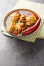 Chicken cooked in spicy gravy made with authentic flavour of malvani closeup on the bowl. Vertical Royalty Free Stock Photo