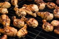 Chicken cooking on a grill