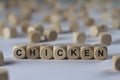 Chicken - cube with letters, sign with wooden cubes