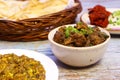 Chicken curry with egg tarka and rumali roti Royalty Free Stock Photo