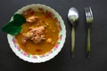 chicken curry or kari ayam served on bowl, isolated on white background. Royalty Free Stock Photo