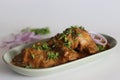 Chicken curry prepared by chicken in cashew gravy garnished with fresh coriander leaves Royalty Free Stock Photo