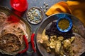 Chicken curry, rice and bread chapati on a metal plate. Indian dish Royalty Free Stock Photo