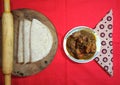 Chicken curry with roti, traditional bengali food