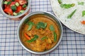 Chicken curry serving bowls from above