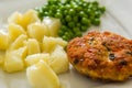Chicken cutlet with green peas