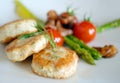 Chicken cutlets with asparagus and tomatoes