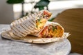 Chicken doner kebab and fresh vegetables in roll of pita bread lavash - Durum Chicken Doner Kebab Royalty Free Stock Photo