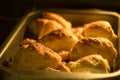 Chicken in dough cooking in oven