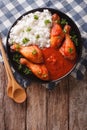 Chicken drumstick with Sriracha chilli sauce and rice garnish. V Royalty Free Stock Photo