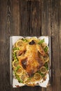 Chicken or duck baked in oven on festive dinner table,top view Royalty Free Stock Photo