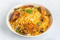 Chicken Dum Biryani in a White Bowl - Traditional Indian One Pot Dish