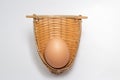 Chicken egg in bamboo weave basket on white Royalty Free Stock Photo
