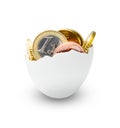 Chicken egg shell filled with euro coins. Symbol of finance, accumulation and wealth or something else. White background Royalty Free Stock Photo