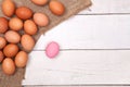 Chicken egg on wood table on sack with preserved egg and space Royalty Free Stock Photo