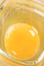 Chicken egg yolk in the glass bowl Royalty Free Stock Photo