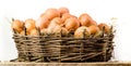 Chicken eggs in basket isolated. Organic food Royalty Free Stock Photo