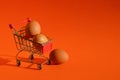 chicken eggs in the cart for groceries, shopping. Happy Easter. preparation for the spring holiday.