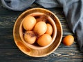 Chicken eggs, feather farming nutritious decorative seasonal breakfast on wooden background organic, cooking Royalty Free Stock Photo