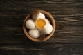 Chicken eggs, feather vintage  nutritious   on wooden background farm Royalty Free Stock Photo