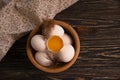 Chicken eggs, feather vintage seasonal nutritious on wooden background farm Royalty Free Stock Photo