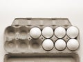 7 Chicken eggs that are fresh in a cardboard package made of recycled waste paper Royalty Free Stock Photo