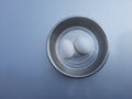 Chicken eggs image in pot , Two eggs image in white Background, Background Blur, Royalty Free Stock Photo