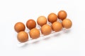 Chicken eggs in plastic package on white. Royalty Free Stock Photo